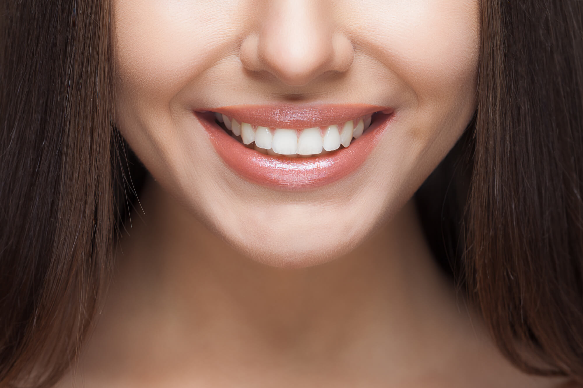 Which is Better: Dental Veneers, Crowns, or Implants?