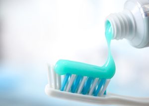 toothpaste on a toothbrush