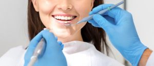 woman visiting our dentist near you